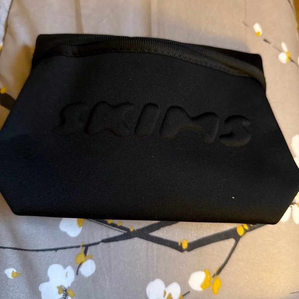 Skims Black small pouch